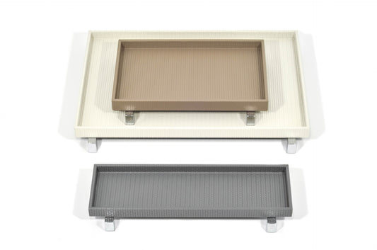 Pinetti | Rialto Leather Tray: Wood base covered in leather with metal feet in chrome, satin, or burnished finish, round and rectangular forms | Tabletop | 2Jour Concierge, your luxury lifestyle shop | luxury tray, Pinetti Rialto, leather tray with feet, raised leather tray, Italian luxury tabletop, designer serving tray, wood leather tray