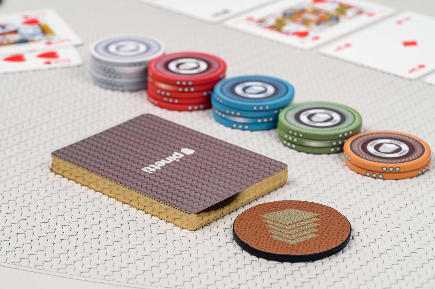 Pinetti Leather-Covered Poker Set | Wooden box fully covered in leather with magnetic closure | Includes 500 ceramic poker chips set, 2 Pinetti’s card decks, 5 dice, and 3 leather coins | Discover Luxury Game Sets at 2Jour Concierge, #1 luxury high-end gift & lifestyle shop