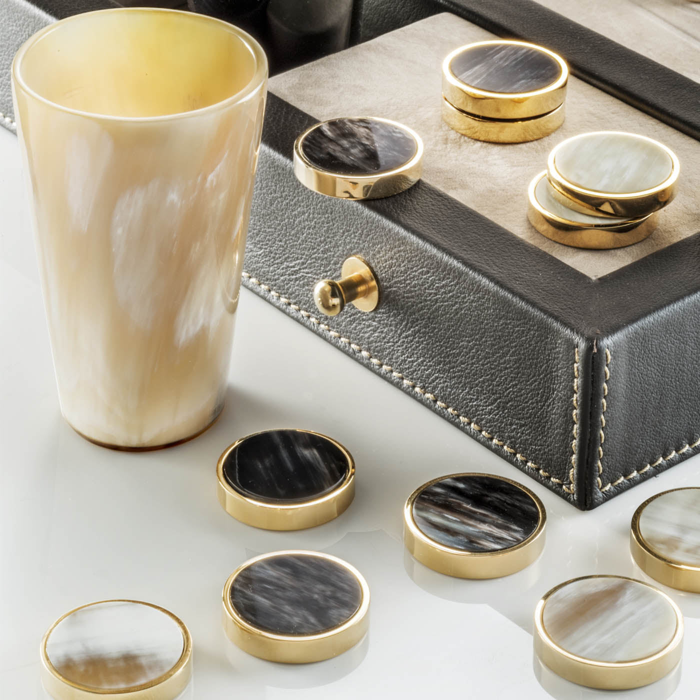Arcahorn Lepanto Dark Brown Tosca Leather Backgammon Set with Beige Stitching | Nabuk Leather Playing Surface | Glossy Horn Stones | 24K Gold Plated Brass Accessories | Explore a Range of Luxury Board Games at 2Jour Concierge, #1 luxury high-end gift & lifestyle shop
