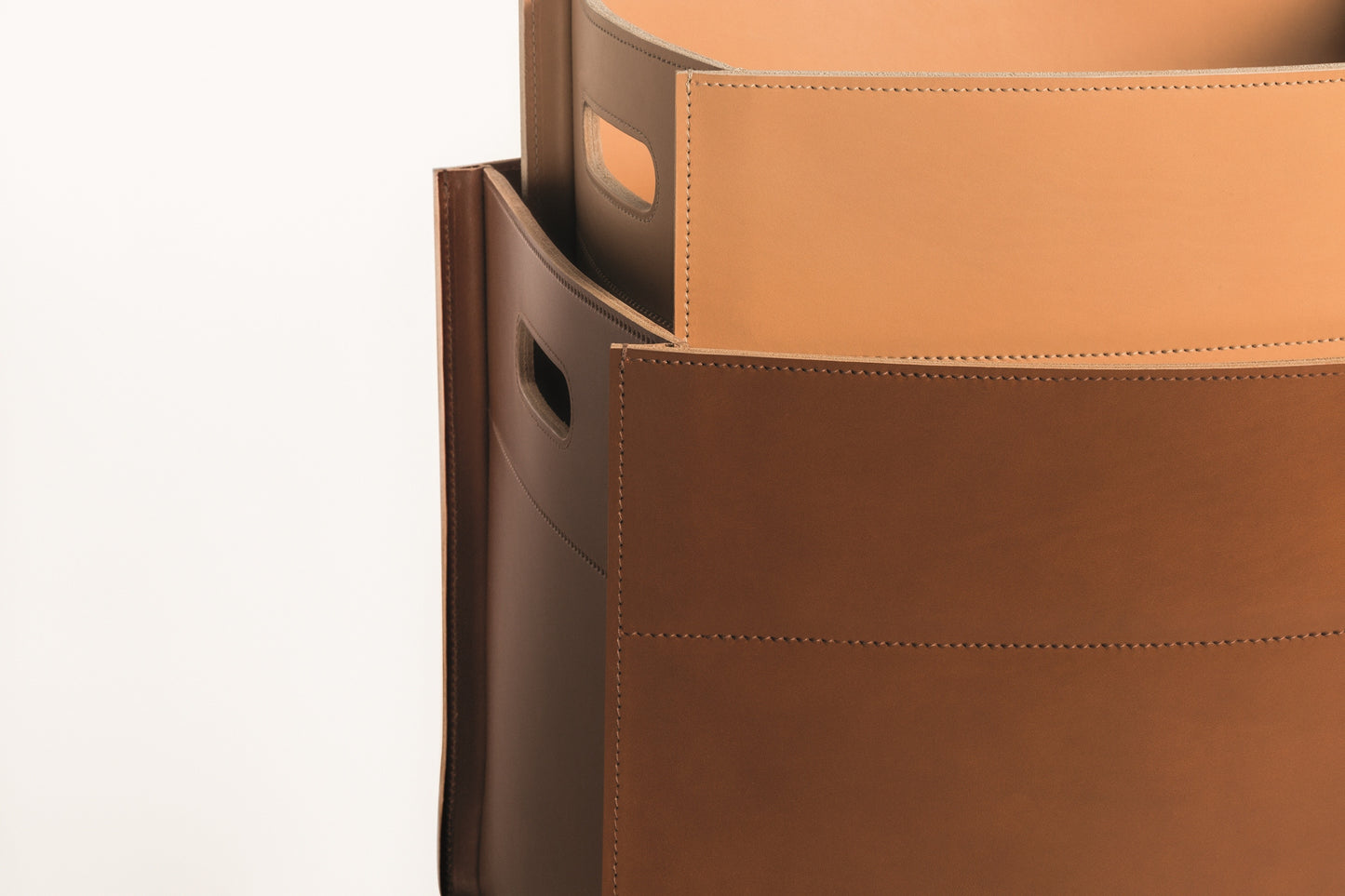 Rabitti 1969 Delta Saddle Leather Storage Basket With Handles | Elegant and Functional Storage Solution | Crafted with High-Quality Saddle Leather | Handles for Convenient Use | Explore a Range of Luxury Home Accessories at 2Jour Concierge, #1 luxury high-end gift & lifestyle shop