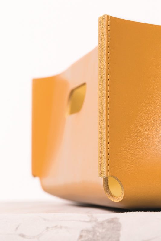 Rabitti 1969 Amsterdam Classic Low Saddle Leather Storage Basket With Handles | Elegant and Functional Storage Solution | Crafted with High-Quality Saddle Leather | Handles for Convenient Use | Explore a Range of Luxury Home Accessories at 2Jour Concierge, #1 luxury high-end gift & lifestyle shop