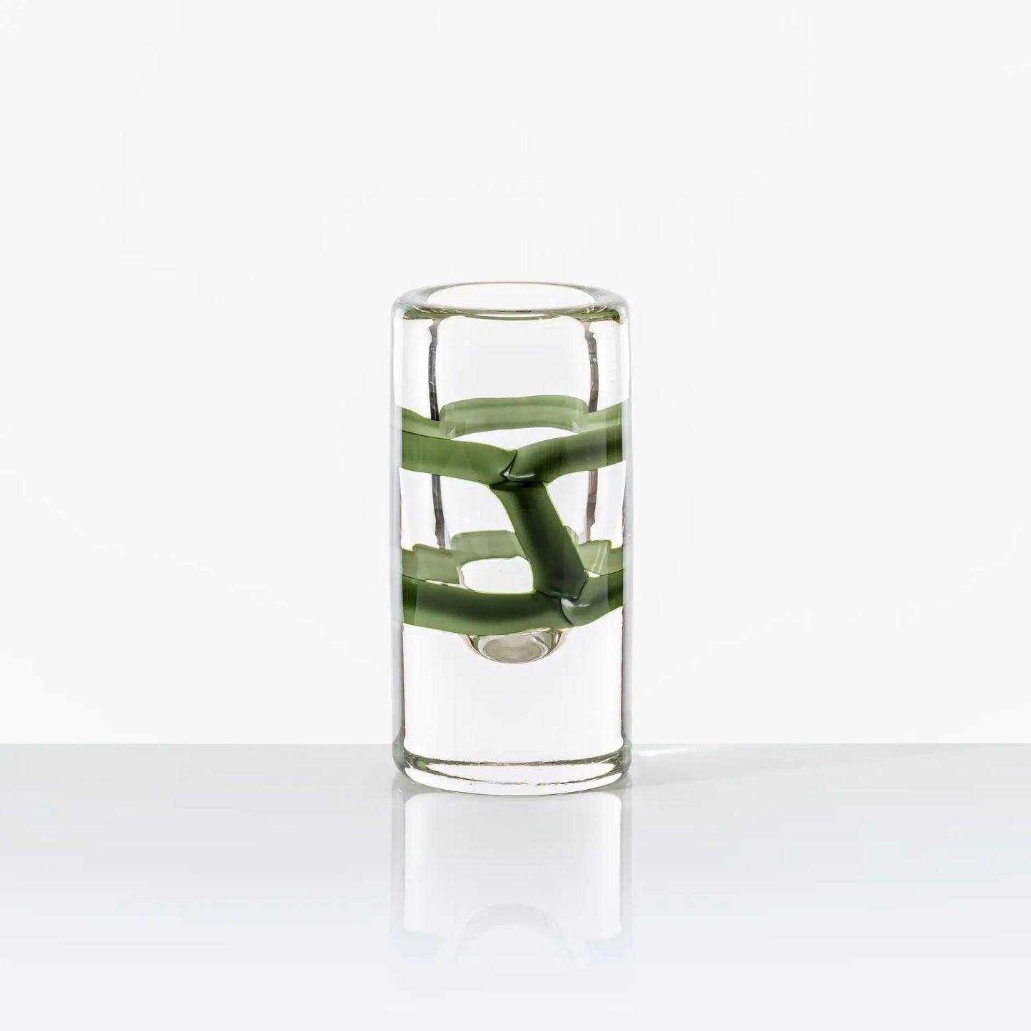 Cilindro Murano Glass Vase by Venini | New color variations featuring transparent bands in Tea or Green Apple-Milk White, creating an elegant contrast with crystal clear glass | Tea color version adorned with glazed Gold decorations | Designer: Peter Marino | Limited edition of 349 art works | Available in heights of 14 and 40 centimeters | Home Decor Vases | 2Jour Concierge, your luxury lifestyle shop