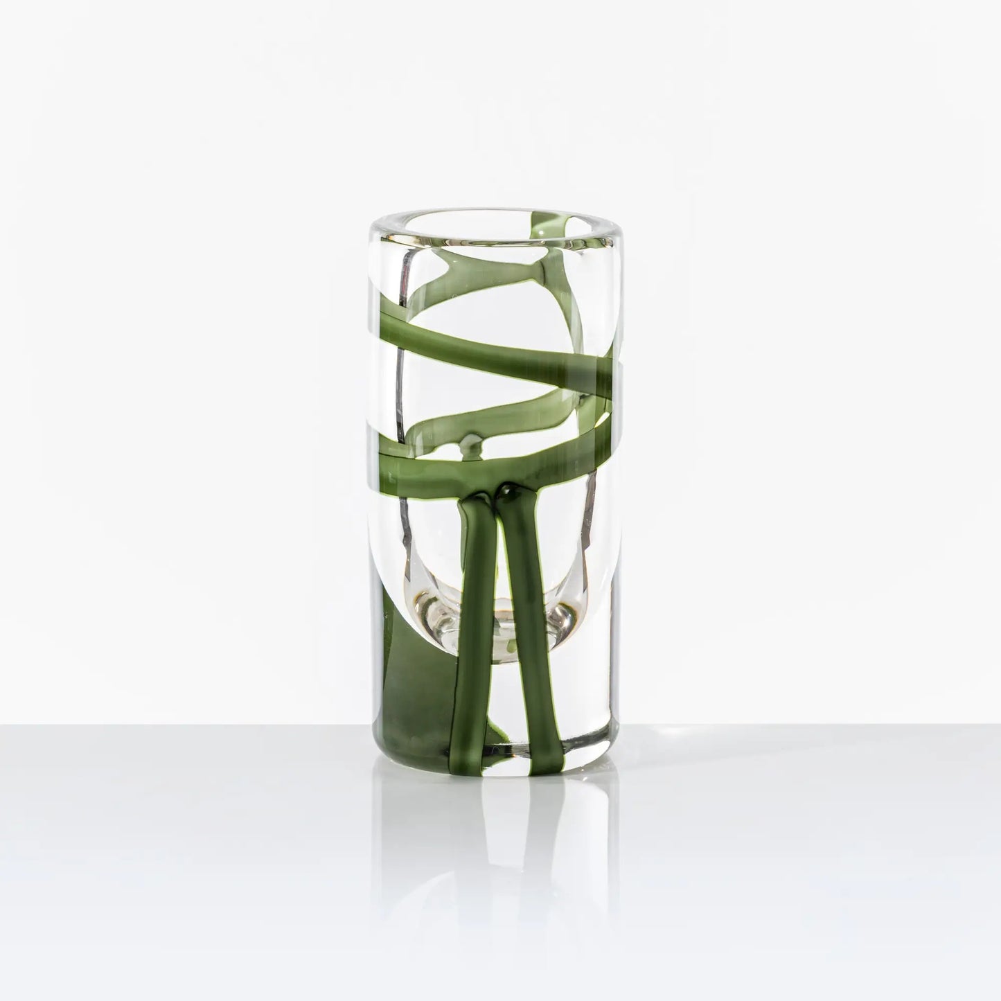 Cilindro Murano Glass Vase by Venini | New color variations featuring transparent bands in Tea or Green Apple-Milk White, creating an elegant contrast with crystal clear glass | Tea color version adorned with glazed Gold decorations | Designer: Peter Marino | Limited edition of 349 art works | Available in heights of 14 and 40 centimeters | Home Decor Vases | 2Jour Concierge, your luxury lifestyle shop