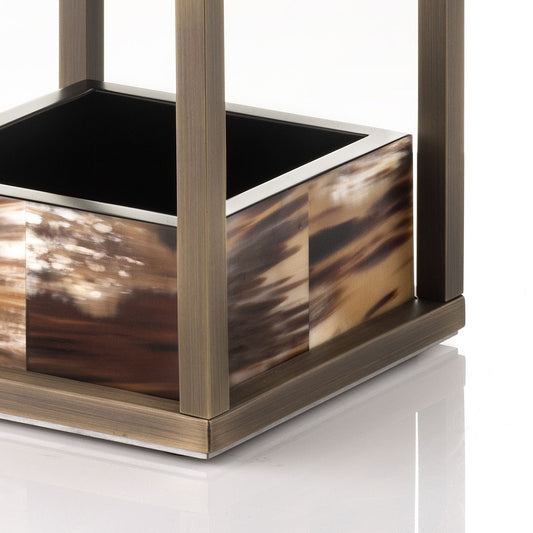 Pluvio Umbrella Stand by Arcahorn | Structure crafted in burnished brass with a base made of matte black lacquered wood featuring matte horn inlays. Includes a removable glass tray. | Home Decor and Organization | 2Jour Concierge, your luxury lifestyle shop
