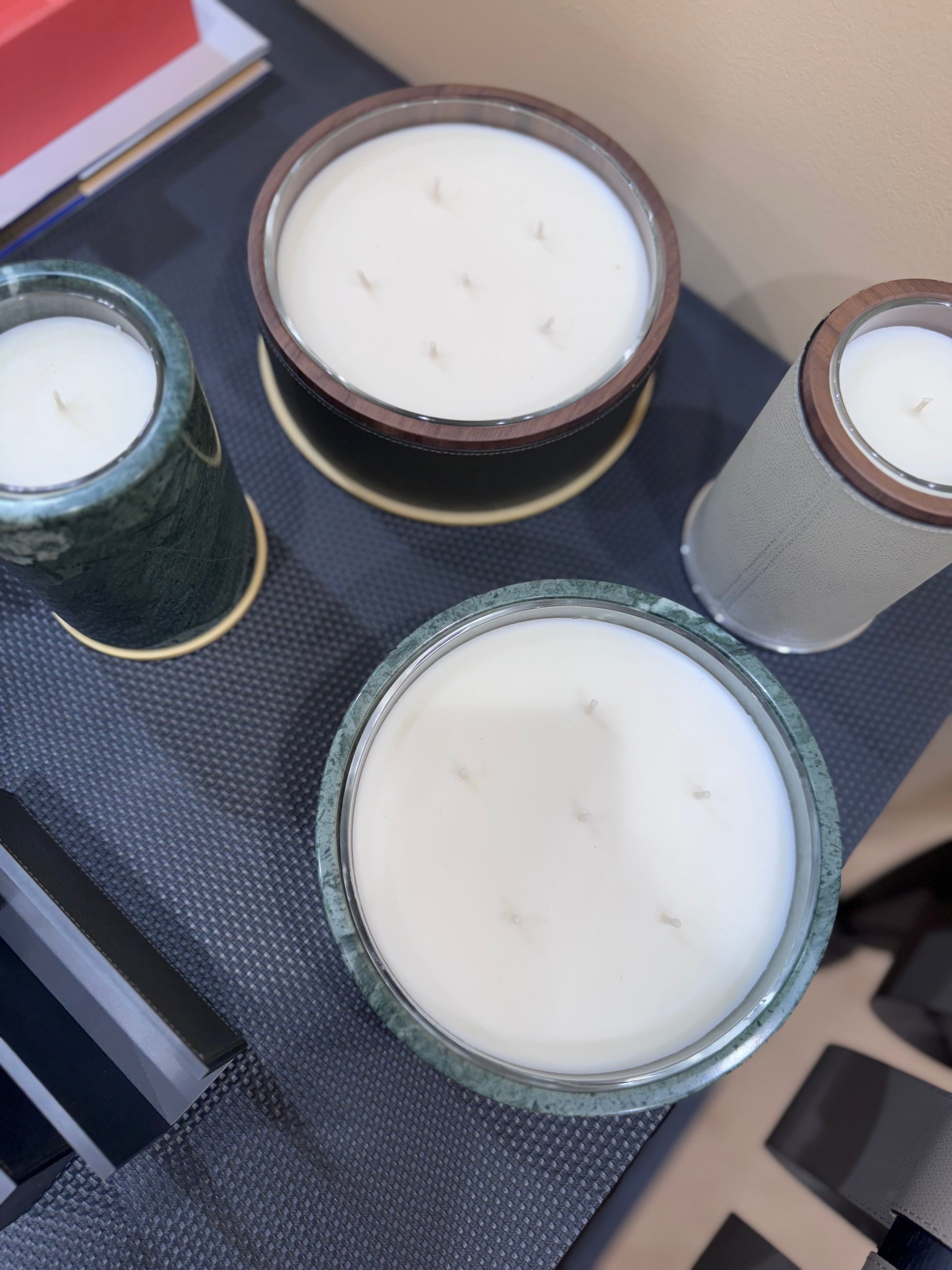 Giobagnara Positano | Candle Holder: Leather with walnut wood trim and metal base, smooth finish, with removable wax candle insert | Decor / Vases & Candle Holders | 2Jour Concierge, your luxury lifestyle shop | luxury interiors, hospitality décor, elegant living, designer home accessories, boutique hotels, refined lifestyle, yacht décor