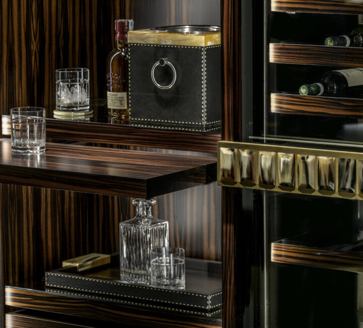 Arcahorn Manhattan Wine Cellar Cabinet | Matte Makassar Ebony Veneer | Burnished Brass Handles with Multifaceted Horn Gems | Backlit Interior in Ebony and Oak Veneer | Sliding Trays for Wine, Champagne, and Magnum Bottles | Multi-temperature Refrigeration System | Explore Luxury Home Accessories at 2Jour Concierge, #1 luxury high-end gift & lifestyle shop