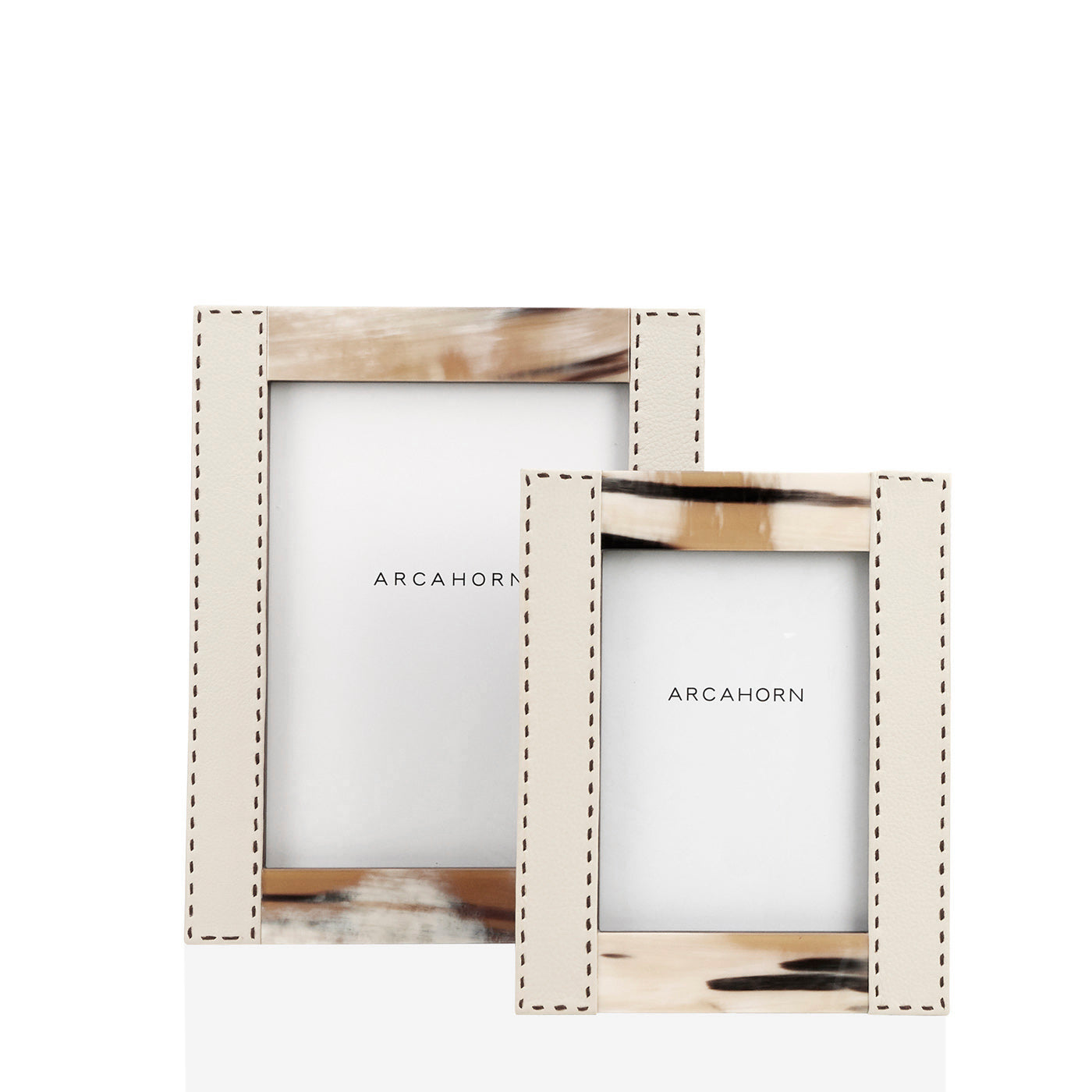 Arcahorn Dorotea Picture Frame | Glossy Horn and Aida Pebbled Leather in Ice-Cream with Handmade Dark Brown Stitching | Matte Amara Ebony Veneer Rim and Back | Designed by Filippo Dini | Ideal for Yachts and Offices | Explore Luxury Home Accessories at 2Jour Concierge, #1 luxury high-end gift & lifestyle shop