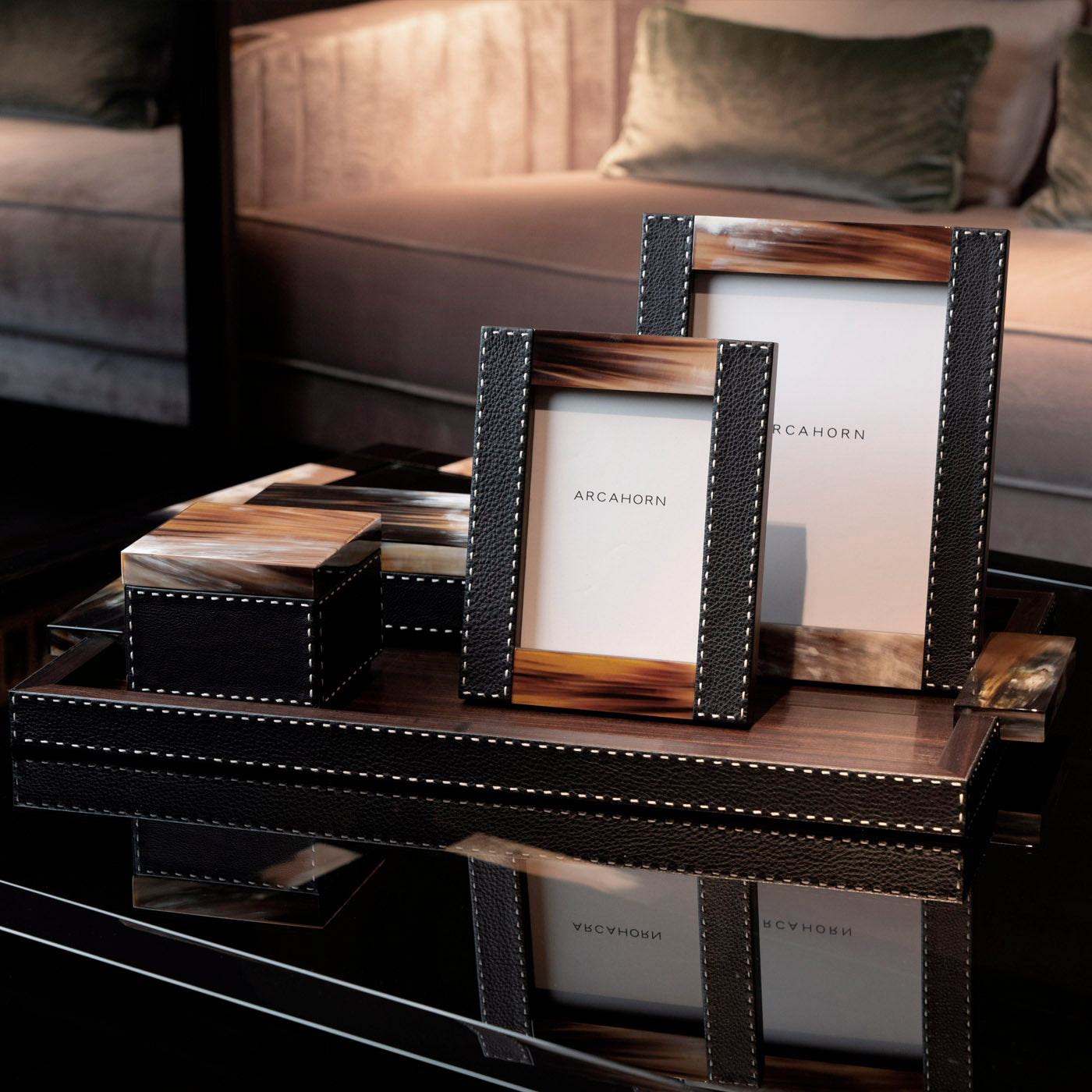 Arcahorn Dorotea Picture Frame | Glossy Horn and Aida Pebbled Leather in Onyx with Handmade Ivory Stitching | Matte Amara Ebony Veneer Rim and Back | Designed by Filippo Dini | Perfect for Yachts and Offices | Discover Luxury Home Accessories at 2Jour Concierge, #1 luxury high-end gift & lifestyle shop