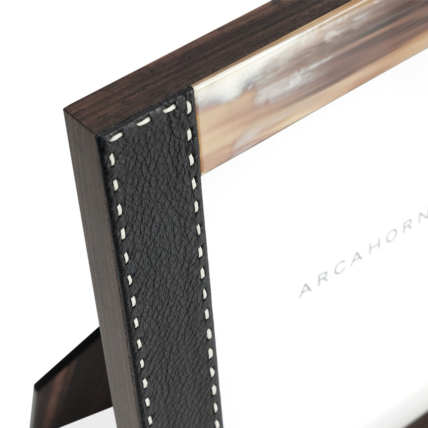 Arcahorn Dorotea Picture Frame | Glossy Horn and Aida Pebbled Leather in Onyx with Handmade Ivory Stitching | Matte Amara Ebony Veneer Rim and Back | Designed by Filippo Dini | Perfect for Yachts and Offices | Discover Luxury Home Accessories at 2Jour Concierge, #1 luxury high-end gift & lifestyle shop
