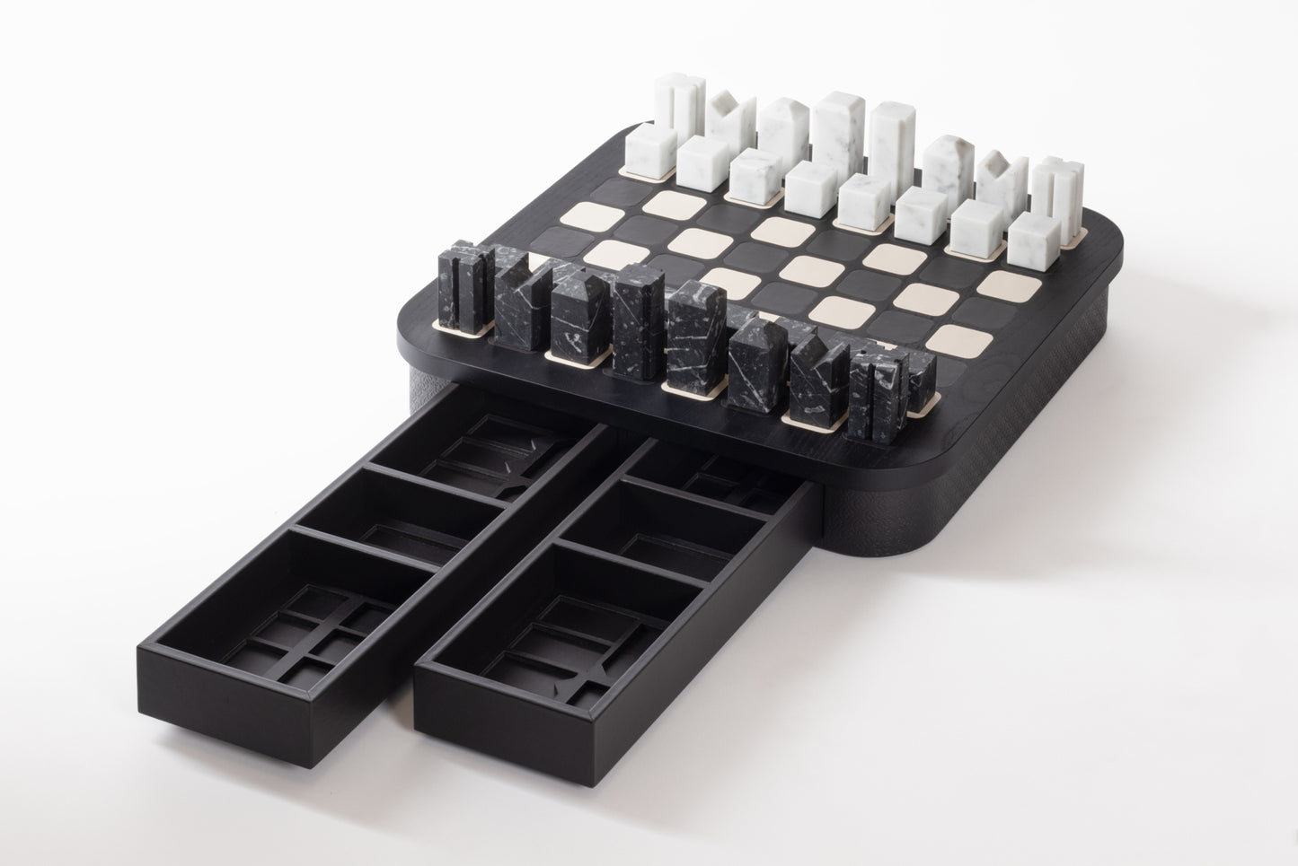 Giobagnara x Elie Saab Monogram Big Chess Game Set | Wood structure with fine leather inserts on top and a leather base featuring the Elie Saab Monogram pattern | Base encases magnetic drawers for storing playing pieces | Includes two sets of chess pieces made from white Carrara and black Marquinia marbles | Elegant and luxurious chess set | Home Decor and Games | 2Jour Concierge, your luxury lifestyle shop