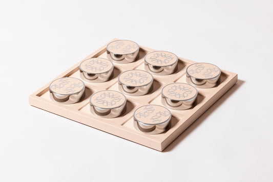 Giobagnara x Elie Saab Ecusson Tic Tac Toe | Leather tray with dividers featuring the Elie Saab Monogram pattern | Includes polished palladium playing pieces with leather inserts and shiny silver debossed decorations | Games and Entertainment | 2Jour Concierge, your luxury lifestyle shop