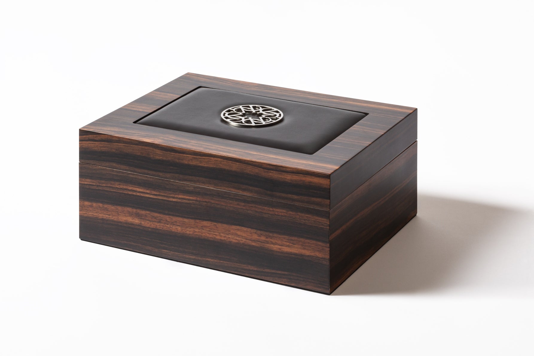 Giobagnara x Elie Saab Ecusson Cigar Humidor | Macassar ebony cigar humidor with padded leather inlay featuring the Elie Saab Monogram in polished palladium | Cedar wood lining | Luxurious and elegant storage for cigars | Home Decor and Accessories | 2Jour Concierge, your luxury lifestyle shop