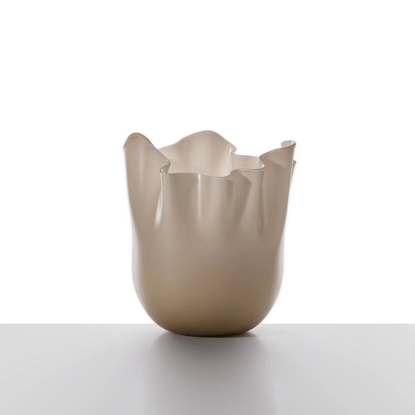 Venini Fazzoletto Vase | An iconic Murano glass vase with a fluid, wavy rim, each piece unique thanks to the masterful "flying hand" technique | Designed by Fulvio Bianconi and Paolo Venini in 1948, the Fazzoletto—meaning "handkerchief"—captures the lightness and elegance of softly draped fabric | A timeless expression of Venetian craftsmanship and artistic innovation | Design by Venini | Tableware & decorative objects | 2Jour Concierge, your luxury lifestyle shop