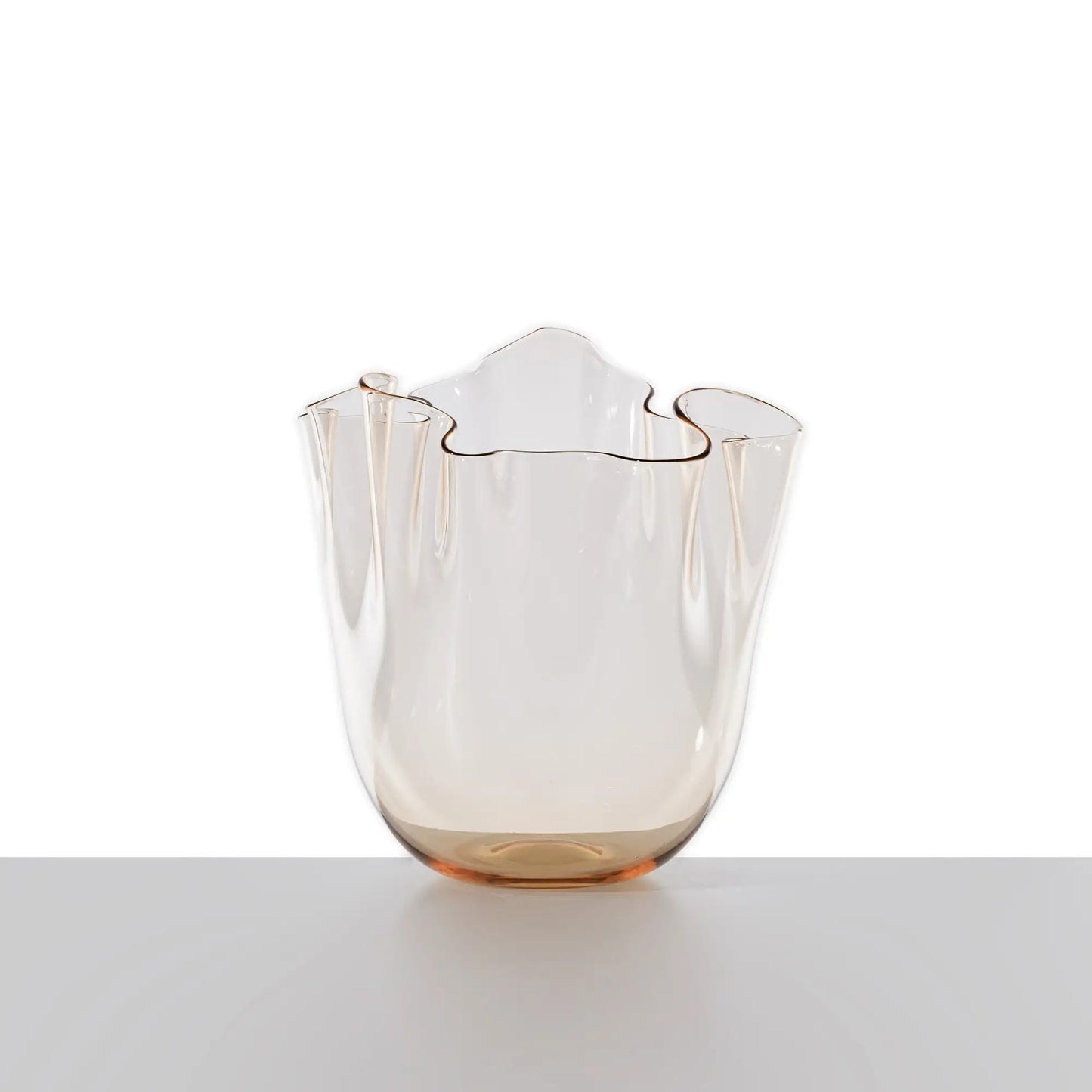 Venini Fazzoletto Vase | An iconic Murano glass vase with a fluid, wavy rim, each piece unique thanks to the masterful "flying hand" technique | Designed by Fulvio Bianconi and Paolo Venini in 1948, the Fazzoletto—meaning "handkerchief"—captures the lightness and elegance of softly draped fabric | A timeless expression of Venetian craftsmanship and artistic innovation | Design by Venini | Tableware & decorative objects | 2Jour Concierge, your luxury lifestyle shop