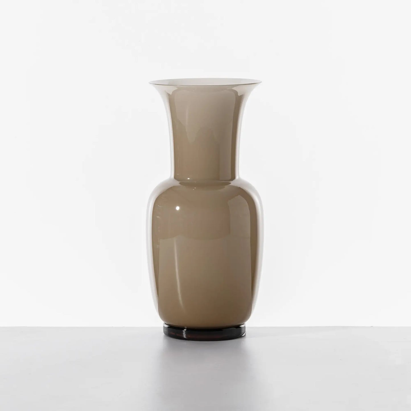 Venini Opalino Vase | A timeless Murano glass vase embodying purity and essential, perfect lines | Handmade and mouth-blown, this iconic piece has graced exhibitions and publications worldwide for over eighty years | First designed in 1932, Opalino represents the enduring elegance and craftsmanship of Venini | A refined statement for sophisticated interiors | Design by Venini | Tableware & decorative objects | 2Jour Concierge, your luxury lifestyle shop