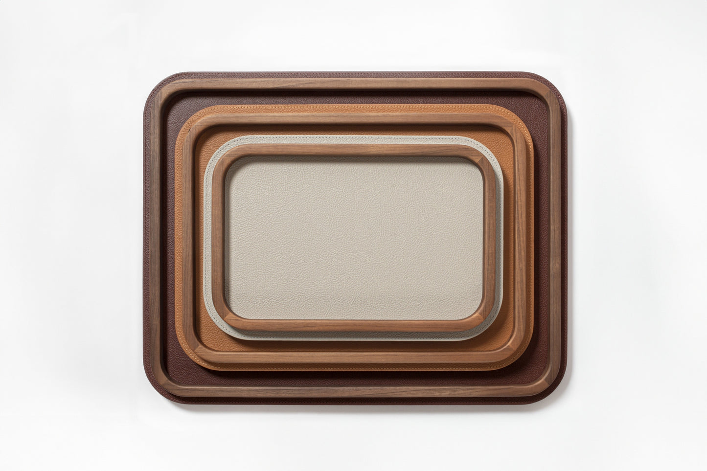 Giobagnara x Poltrona Frau Rectangular Rounded Tray with Wood Frame | Leather-Covered Trays with Rounded Corners | Walnut Wood Frame for Elegant Design | Explore a Range of Stylish Trays and Home Decor at 2Jour Concierge, #1 luxury high-end gift & lifestyle shop
