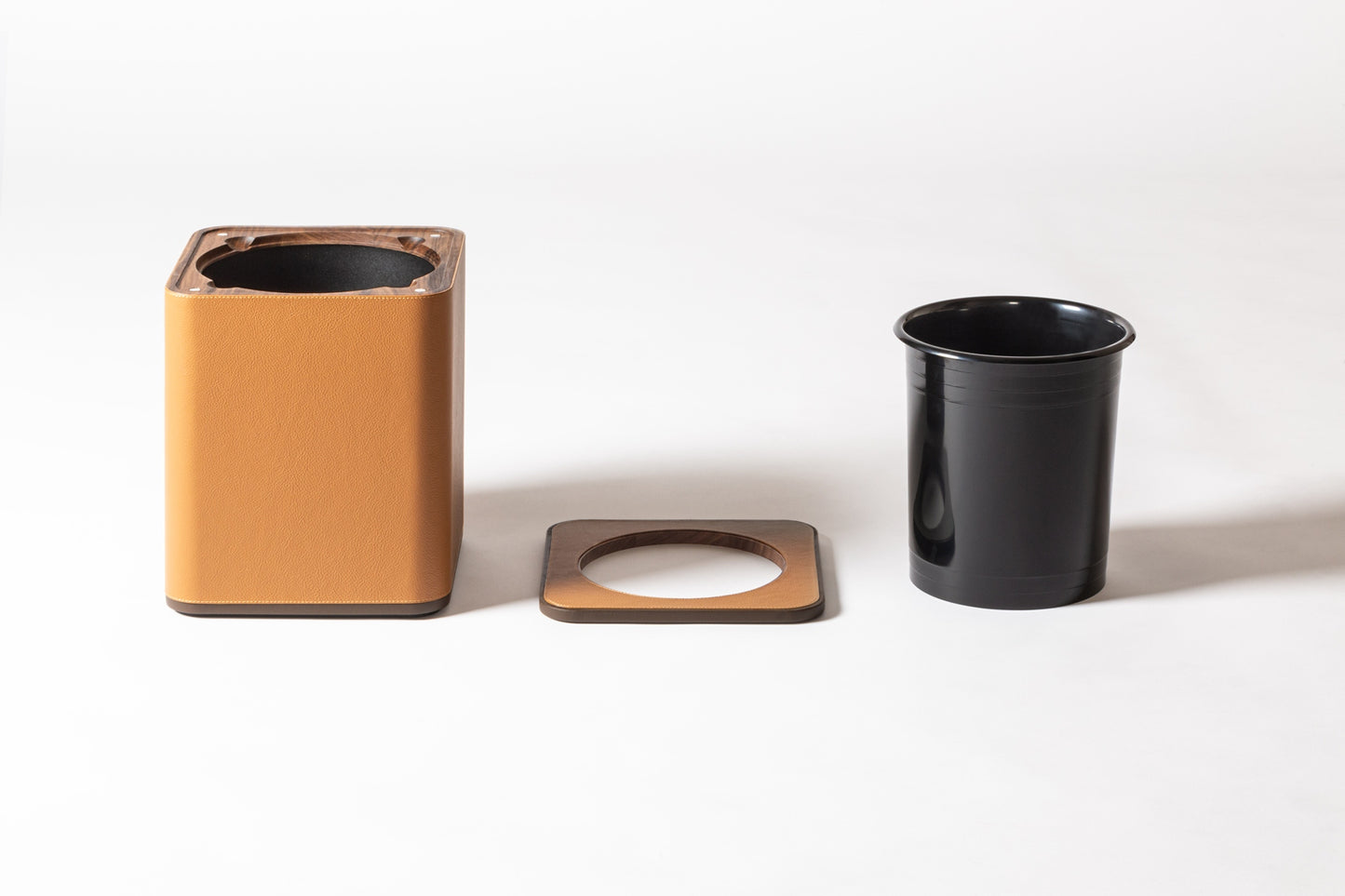 Giobagnara x Poltrona Frau Wastepaper Bin | Leather-Covered Wood Structure | Inner Black Plastic Container | Removable Leather-Covered Wooden Lid | Made in Pelle Frau® Leather | Find Elegant Office Accessories at 2Jour Concierge, #1 luxury high-end gift & lifestyle shop