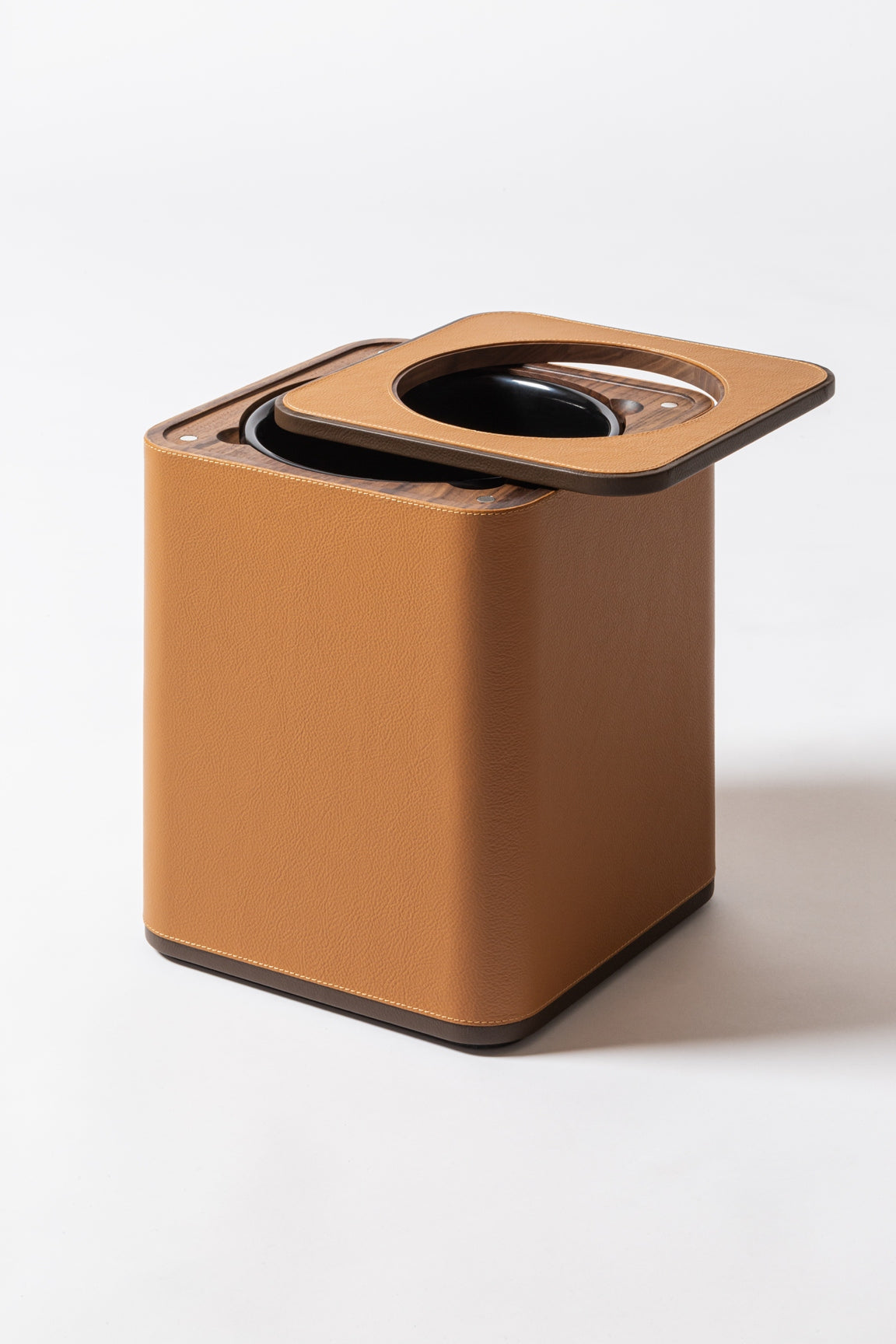 Giobagnara x Poltrona Frau Wastepaper Bin | Leather-Covered Wood Structure | Inner Black Plastic Container | Removable Leather-Covered Wooden Lid | Made in Pelle Frau® Leather | Find Elegant Office Accessories at 2Jour Concierge, #1 luxury high-end gift & lifestyle shop