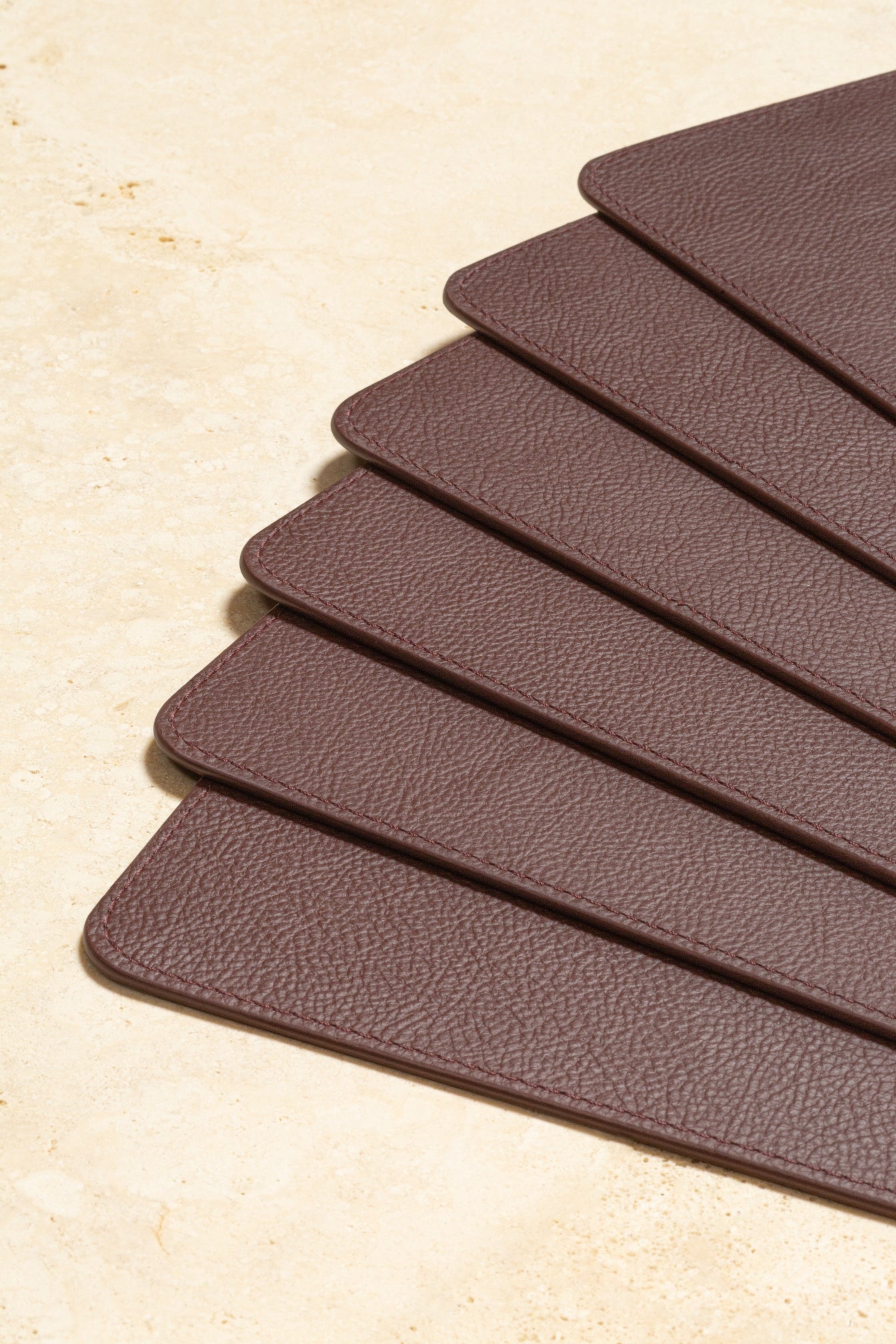 Giobagnara x Poltrona Frau Placemat Holder With 6 Placemats | All-Leather Placemats | Leather-Covered Placemat Holder with Walnut Wood Inserts | Stylish and Elegant Dining Accessories | Explore a Range of Luxury Home Decor at 2Jour Concierge, #1 luxury high-end gift & lifestyle shop