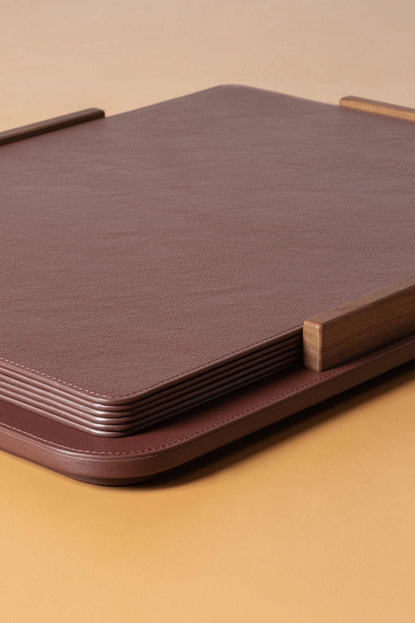 Giobagnara x Poltrona Frau Placemat Holder With 6 Placemats | All-Leather Placemats | Leather-Covered Placemat Holder with Walnut Wood Inserts | Stylish and Elegant Dining Accessories | Explore a Range of Luxury Home Decor at 2Jour Concierge, #1 luxury high-end gift & lifestyle shop