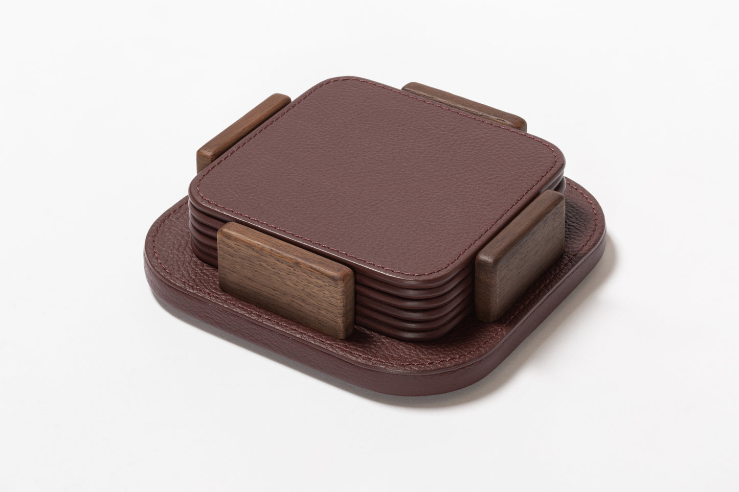 Giobagnara x Poltrona Frau Coaster Holder With 6 Coasters | All-Leather Coasters | Leather-Covered Coaster Holder with Walnut Wood Inserts | Stylish and Elegant Home Accessories | Explore a Range of Luxury Home Decor at 2Jour Concierge, #1 luxury high-end gift & lifestyle shop