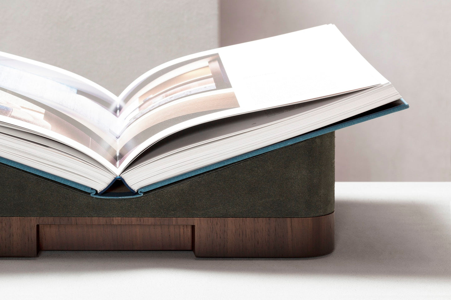 Giobagnara x Glenn Sestig Lloyd Bookstand | Versatile bookstand crafted in luxurious leather and solid wood—choose between dark-stained Canaletto walnut or wenge finishes—and also available in leather with travertine marble or full travertine marble constructions | Crafted in Italy by Giobagnara in collaboration with designer Glenn Sestig | Home Decor / Desk Accessories | 2Jour Concierge, your luxury lifestyle shop