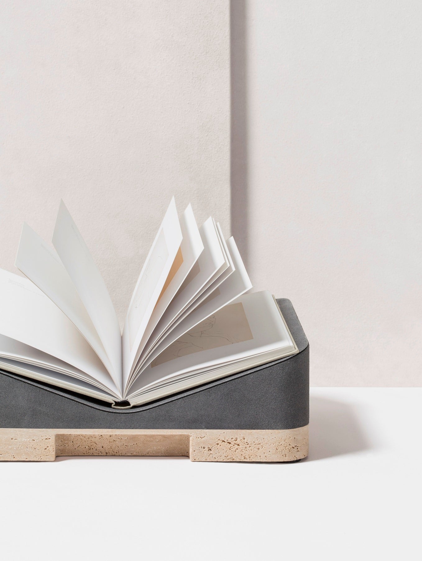 Giobagnara x Glenn Sestig Lloyd Bookstand | Versatile bookstand crafted in luxurious leather and solid wood—choose between dark-stained Canaletto walnut or wenge finishes—and also available in leather with travertine marble or full travertine marble constructions | Crafted in Italy by Giobagnara in collaboration with designer Glenn Sestig | Home Decor / Desk Accessories | 2Jour Concierge, your luxury lifestyle shop