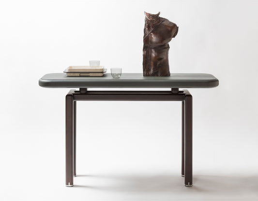 Giobagnara × Glenn Sestig | Lloyd Console: Leather and Canaletto walnut with iron or brushed bronze feet | Furniture / Console Tables + Étageres | 2Jour Concierge, your luxury lifestyle shop | modern craftsmanship, Italian design, sculptural interiors, refined living