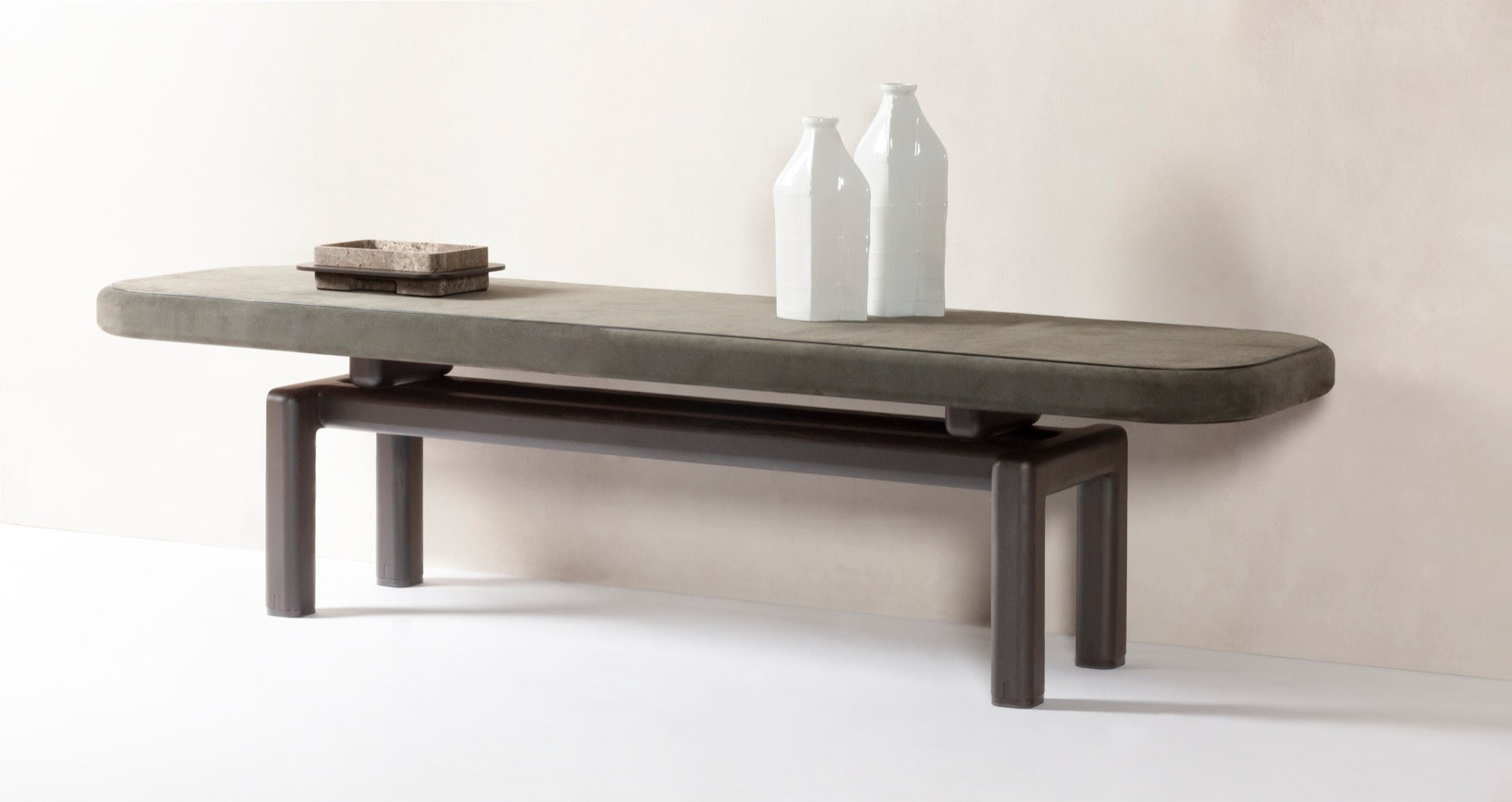 Giobagnara × Glenn Sestig | Lloyd Low Console: Leather and Canaletto walnut with iron or brushed bronze feet | Furniture / Console Tables + Étageres | 2Jour Concierge, your luxury lifestyle shop | architectural furniture, refined craftsmanship, Italian modern design, bespoke interiors