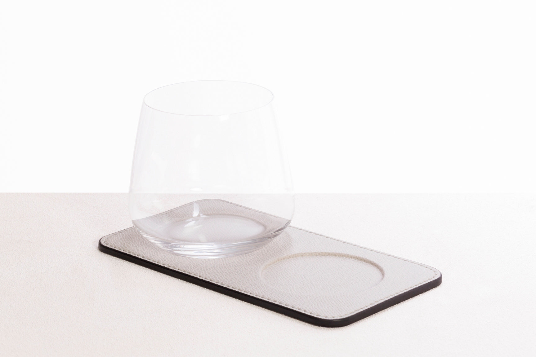 Giobagnara Double Glass Coaster with 2 Debossed Spaces | All-leather structure designed to host two glasses | Semi-flexible and waterproof | Stylish and practical for organized entertaining | Home Decor and Serveware | 2Jour Concierge, your luxury lifestyle shop
