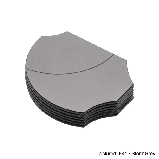 Giobagnara | Margo Coaster Set: Calfskin and Corian® coaster set with holder | Serveware + Hospitality / Coasters | 2Jour Concierge, your luxury lifestyle shop | premium table accessories for refined dining settings, hospitality spaces, and curated interiors