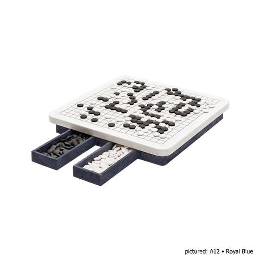 Giobagnara | Delos Go Game Set Corian®: Corian® top with digital-printed leather playing field and Corian® beads | Game Room | 2Jour Concierge, your luxury lifestyle shop | luxury go game Corian, Giobagnara Delos, Corian game board, Italian designer game set