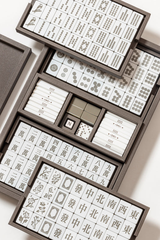 Giobagnara | Mahjong Game Set: Leather-covered wood case with opaque plexiglass tiles, sticks, and dice | Game Room | 2Jour Concierge, your luxury lifestyle shop | luxury mahjong set, Giobagnara mahjong, leather game case, Italian designer game, complete mahjong
