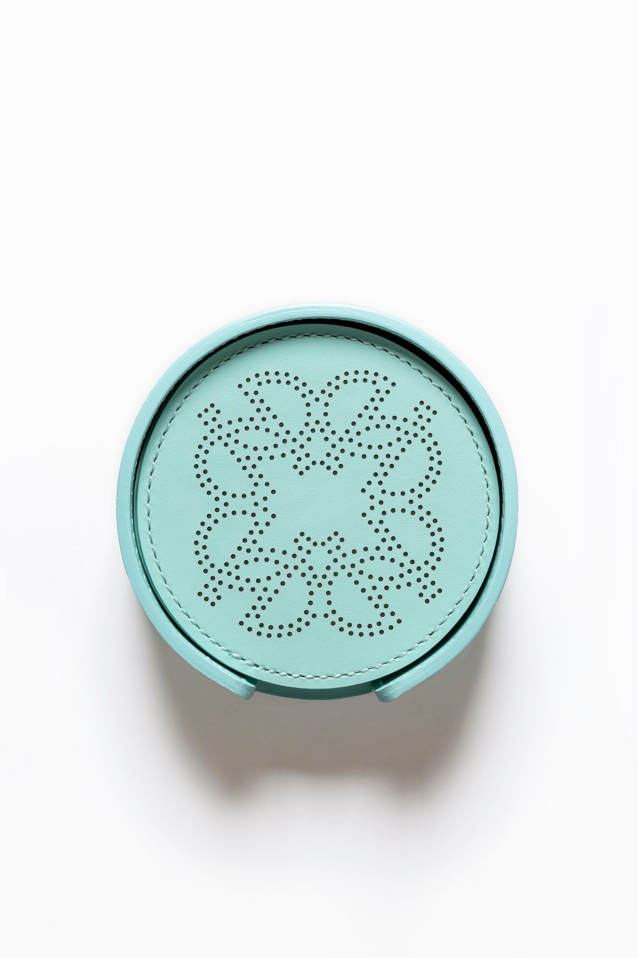 Giobagnara × Elie Saab Ecusson Coaster Holder | Leather coaster holder with matching set of perforated Monogram coasters, water-resistant and UV-protected | Serveware + Hospitality / Coasters | 2Jour Concierge, your luxury lifestyle shop | luxury entertaining, hospitality décor, designer home accessories, boutique hotels, yacht decor, refined lifestyle, table accents