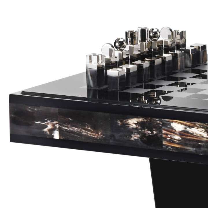 Alfio Chess Table by Arcahorn | Chessboard table in dark horn and wood | Lacquered black gloss finish | Top in tempered smoked glass with silkscreened silver chessboard | Chessmen crafted from horn and palladium plated brass | Furniture and Chess Tables | 2Jour Concierge, your luxury lifestyle shop