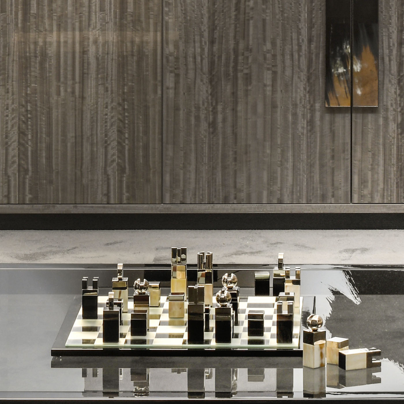 Arcahorn Nelson Lacquered Black Gloss Finish Wood and Mirrored Glass Chessboard with Horn and Palladium Plated Brass Chessmen | Exquisite Craftsmanship and Elegant Design | Perfect for Discerning Chess Enthusiasts | Explore a Range of Luxury Board Games at 2Jour Concierge, #1 luxury high-end gift & lifestyle shop