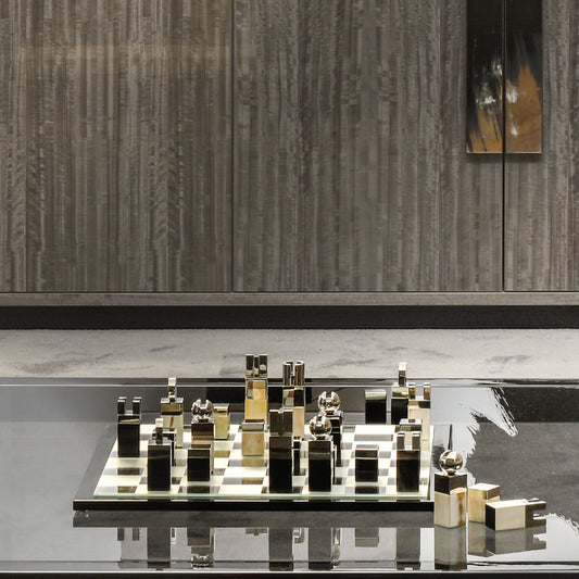 Arcahorn Nelson Lacquered Black Gloss Finish Wood and Mirrored Glass Chessboard with Horn and Palladium Plated Brass Chessmen | Exquisite Craftsmanship and Elegant Design | Perfect for Discerning Chess Enthusiasts | Explore a Range of Luxury Board Games at 2Jour Concierge, #1 luxury high-end gift & lifestyle shop