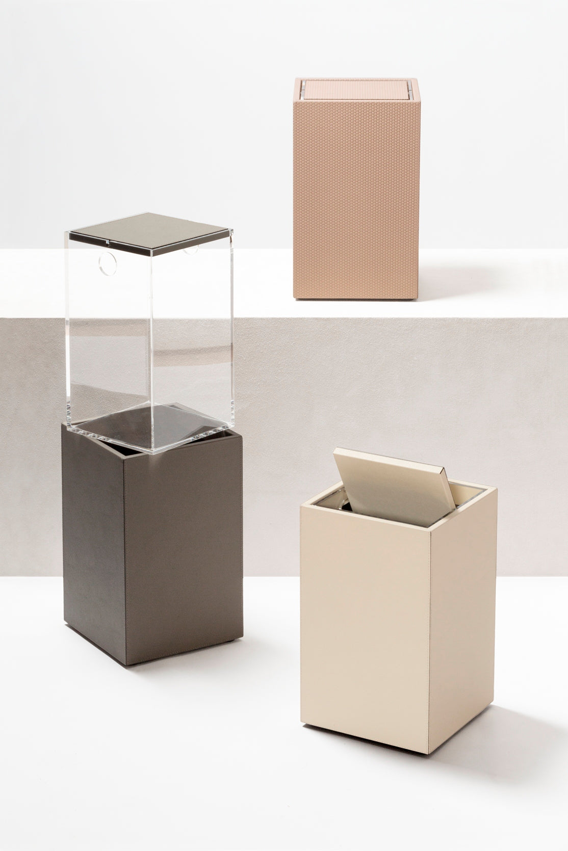 Giobagnara Groove Wastepaper Bin | Leather-covered wood structure | Non-slip waterproof rubber base underneath | Removable tilting lid and plexiglass inner structure for easy cleaning | Discover Luxury Lifestyle Accessories at 2Jour Concierge, #1 luxury high-end gift & lifestyle shop