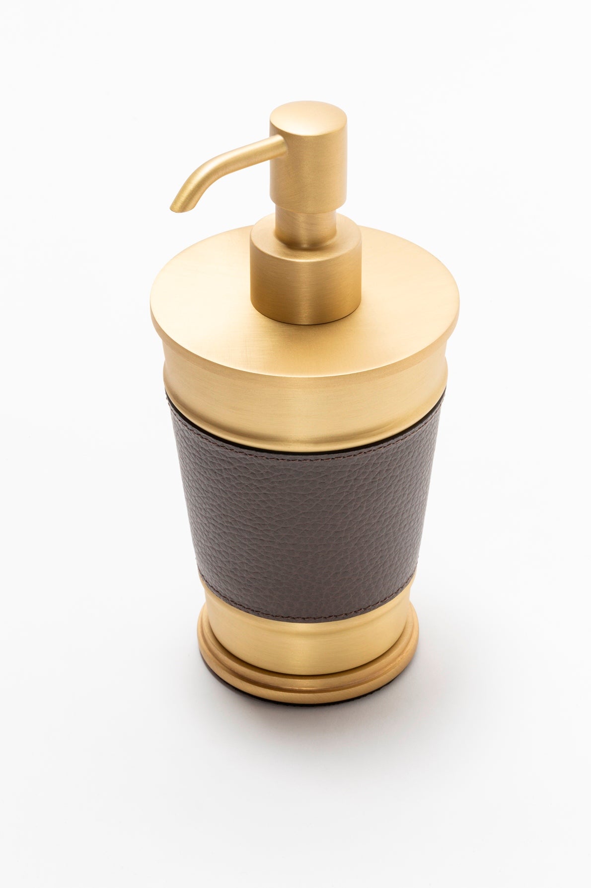 Giobagnara Manhattan soap dispenser | Part of the Manhattan bathroom collection | Features an inverted truncated cone metal structure with fine leather inserts | Decorative indentations create a modern architectural look | Non-slip waterproof rubber base | Available in chrome, bronze, or brass finishes | Bathroom accessories | 2Jour Concierge, your luxury lifestyle shop