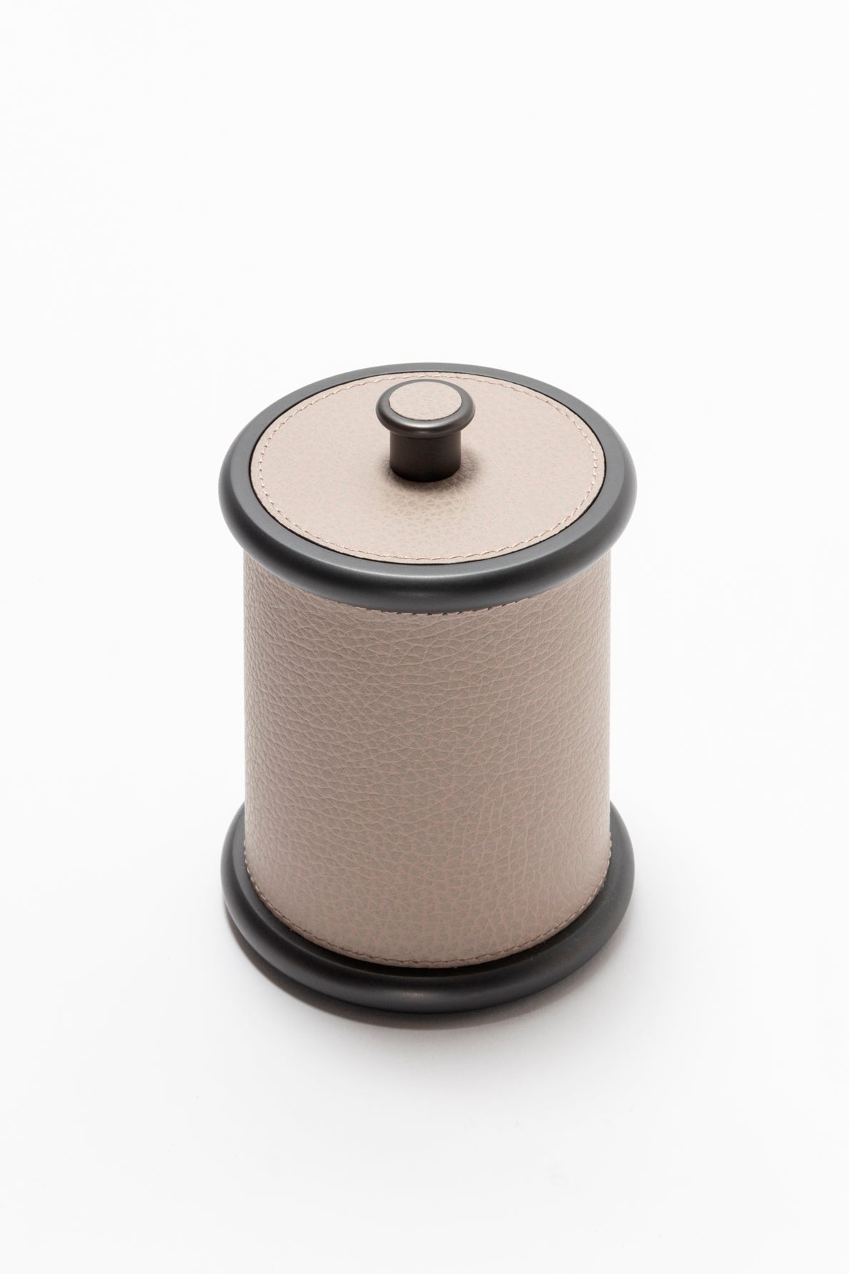 Giobagnara Ravello storage boxes | Part of the Ravello bathroom collection | Cylindrical metal boxes with lid, partially covered in fine Italian leather | Available in small and large sizes | Non-slip waterproof rubber base | Finished in chrome, bronze, or brass | Bathroom accessories | 2Jour Concierge, your luxury lifestyle shop