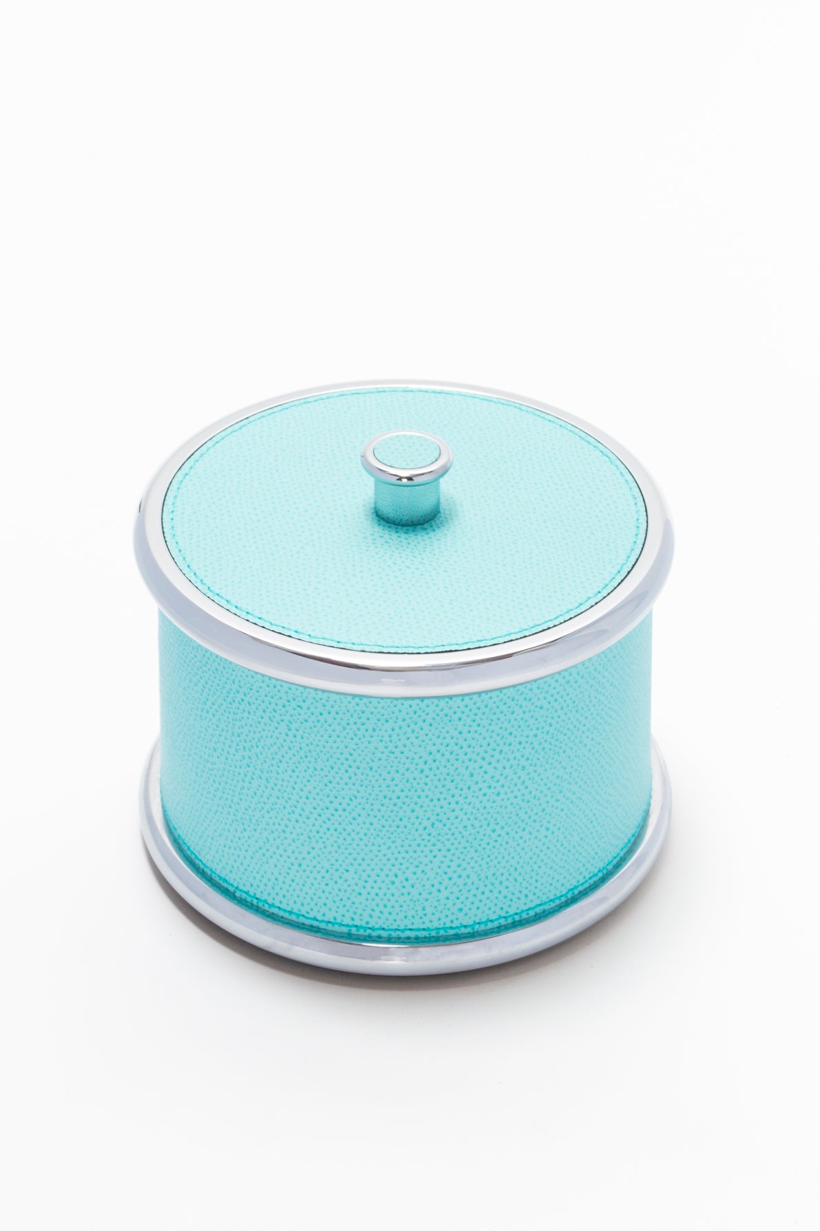 Giobagnara Ravello storage boxes | Part of the Ravello bathroom collection | Cylindrical metal boxes with lid, partially covered in fine Italian leather | Available in small and large sizes | Non-slip waterproof rubber base | Finished in chrome, bronze, or brass | Bathroom accessories | 2Jour Concierge, your luxury lifestyle shop