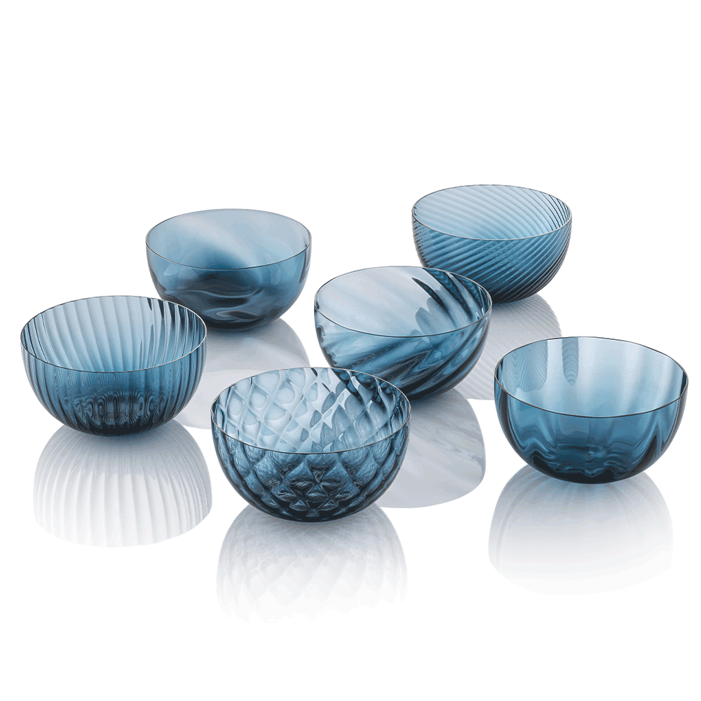 NasonMoretti Idra bowls – set of 6 | Set of six Murano glass bowls in assorted textures and colors | Each bowl features unique hand-blown craftsmanship with textures including optic, torsé, balloton, and more | A vibrant and luxurious addition to modern entertaining | Available in classic and ruby red selections | Design by NasonMoretti | Tableware & bowls | 2Jour Concierge, your luxury lifestyle shop