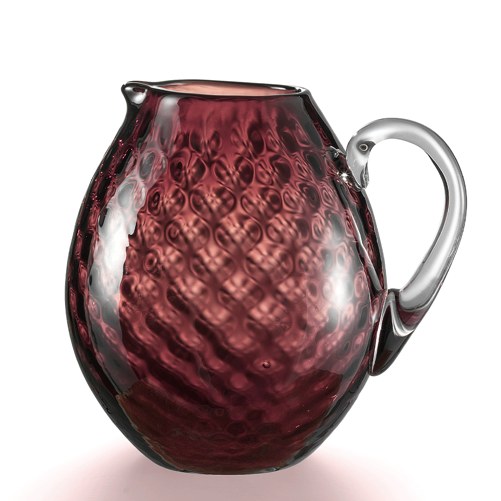 NasonMoretti Idra pitcher | Handcrafted Murano glass pitcher with iconic balloton texture | Rounded form with a crystal-clear sculpted handle for elegant pouring | Available in a vivid color palette including avio blue, grey, red, orange, soraya green, and purple | A bold yet refined statement piece for stylish entertaining | Design by NasonMoretti | Tableware & serveware | 2Jour Concierge, your luxury lifestyle shop