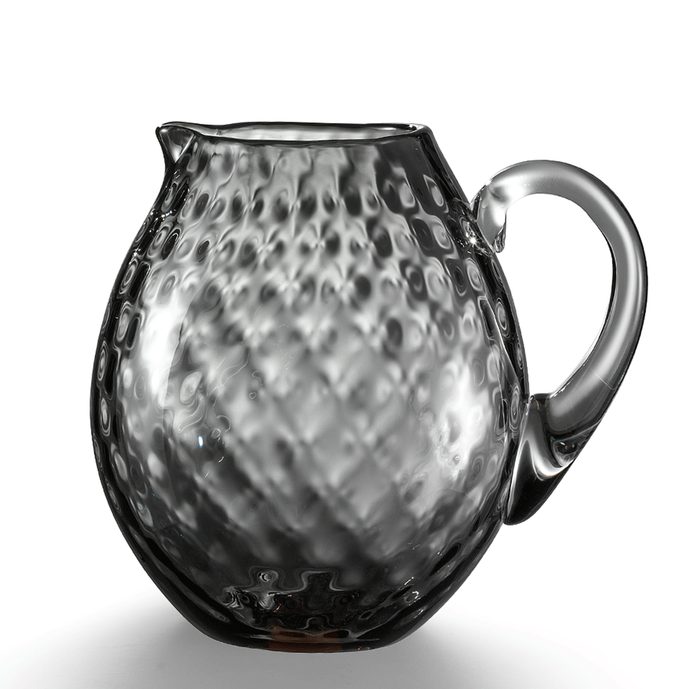 NasonMoretti Idra pitcher | Handcrafted Murano glass pitcher with iconic balloton texture | Rounded form with a crystal-clear sculpted handle for elegant pouring | Available in a vivid color palette including avio blue, grey, red, orange, soraya green, and purple | A bold yet refined statement piece for stylish entertaining | Design by NasonMoretti | Tableware & serveware | 2Jour Concierge, your luxury lifestyle shop