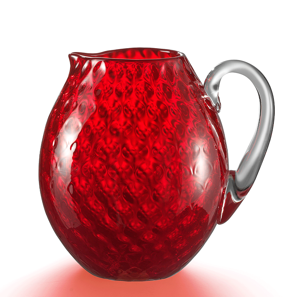 NasonMoretti Idra pitcher | Handcrafted Murano glass pitcher with iconic balloton texture | Rounded form with a crystal-clear sculpted handle for elegant pouring | Available in a vivid color palette including avio blue, grey, red, orange, soraya green, and purple | A bold yet refined statement piece for stylish entertaining | Design by NasonMoretti | Tableware & serveware | 2Jour Concierge, your luxury lifestyle shop
