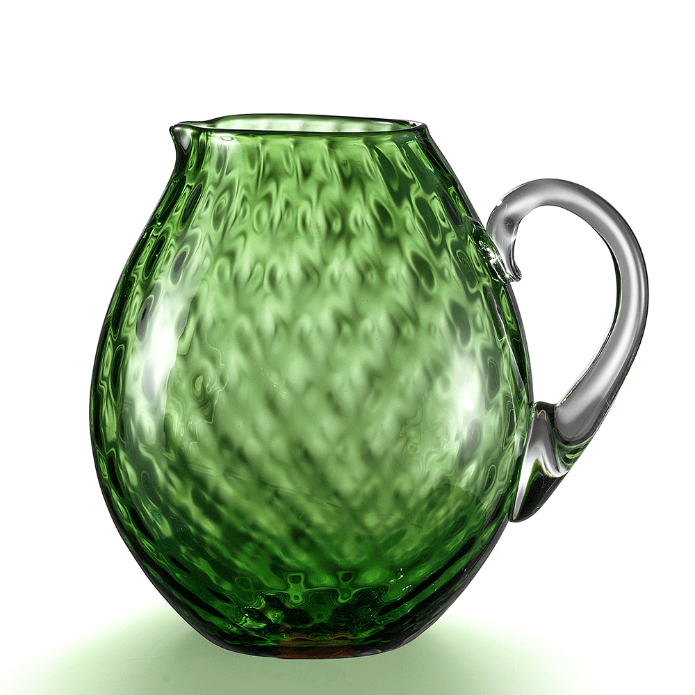 NasonMoretti Idra pitcher | Handcrafted Murano glass pitcher with iconic balloton texture | Rounded form with a crystal-clear sculpted handle for elegant pouring | Available in a vivid color palette including avio blue, grey, red, orange, soraya green, and purple | A bold yet refined statement piece for stylish entertaining | Design by NasonMoretti | Tableware & serveware | 2Jour Concierge, your luxury lifestyle shop