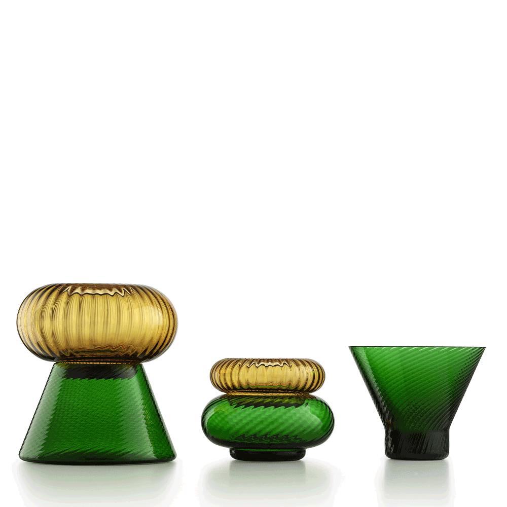 NasonMoretti Issey vase set | A vibrant set of 5 Murano glass vases, designed by Matteo Zorzenoni | Defined by playful modularity and stacked sculptural silhouettes, each vase brings a dynamic presence to the space | Available in expressive color duos: pine green & amber or ruby red & turquoise, with twisted and striped textures | A bold, tactile composition for modern interiors | Design by NasonMoretti | Tableware & decorative objects | 2Jour Concierge, your luxury lifestyle shop