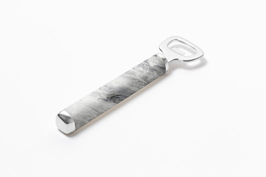 Giobagnara x Kelly Wearstler Maris Bottle Opener | Polished stainless steel bottle opener with marble accents, available in three sophisticated finishes | A perfect blend of utility and style | Barware Accessories | 2Jour Concierge, your luxury lifestyle shop