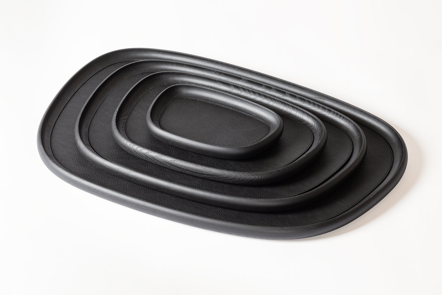 Giobagnara x Kelly Wearstler Maris Wood Stacking Tray Rectangular
Wooden trays with removable leather inlay, available in natural or wenge finish. | Functional and stylish | Home Accessories | 2Jour Concierge, your luxury lifestyle shop