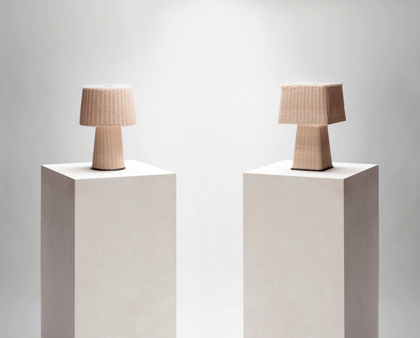 Giobagnara x Stéphane Parmentier Eolie Table Lamp | Meticulously Handmade Woven Rattan | Effortlessly Elegant Design with Pure Forms and Proportions | Rattan Features Warm Natural Nuances and Captivating Light and Dark Effects | Metal Base Provides Subtle Contrast and Texture | Harmonious Combination of Materials for Timeless Appeal